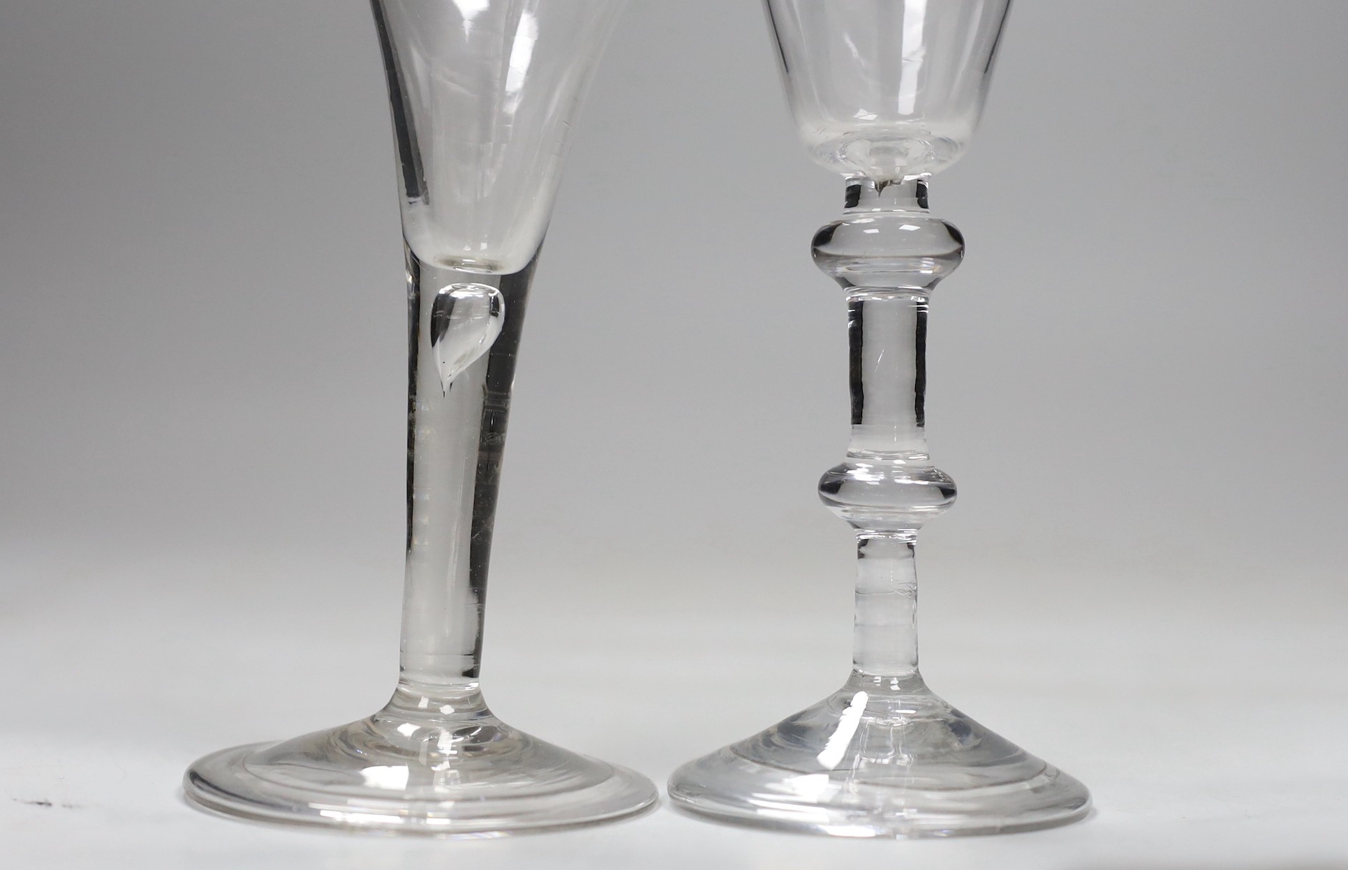 A George II double knopped stem wine glass and a similar ale flute, 16cm